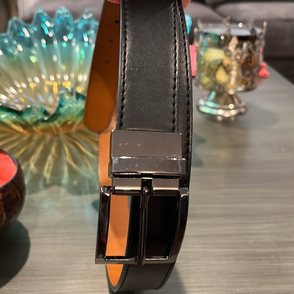 Gunmetal Buckle on Black Belt. Size 40 Man made Leather in India.